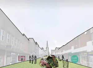 New use for cars — As part of pedestrianisation we would like to suggest a memorial of sorts to cars. The feature would sit in the middle of the High Street and would consist of an old out-of-use car, being used as a planter and being filled with plants. This gesture symbolises the movement of the High Street’s priorities shifting from the automobile to plants, people and food. - 1_5qV59l-Z2_O-_1DJy2oNgw.png