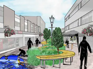 A sketch showing workshops utilising the empty spaces, street furniture, canopies on the side, and street art to brighten and liven the current High Street. - 1_lZXcIupYLTB5bBnb5G-adg.png